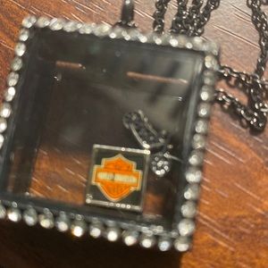Harvey floating locket with motor cycle